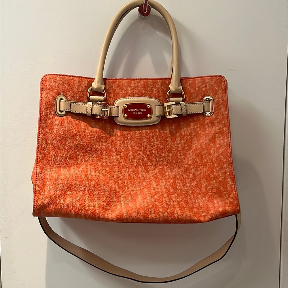 Michael Kors orange handbag with strap